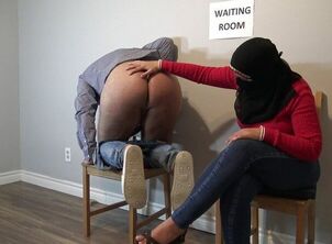 Muslim woman cheating in public waiting