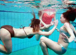 Three teen friends strip in the swimming